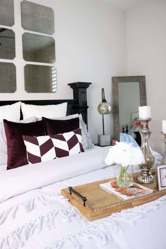 chic guestroom, chic, girl guestroom, guestroom. how to style a guest room, colorful chair, mirror over bed, colorful room, guestroom styling, guestroom check list