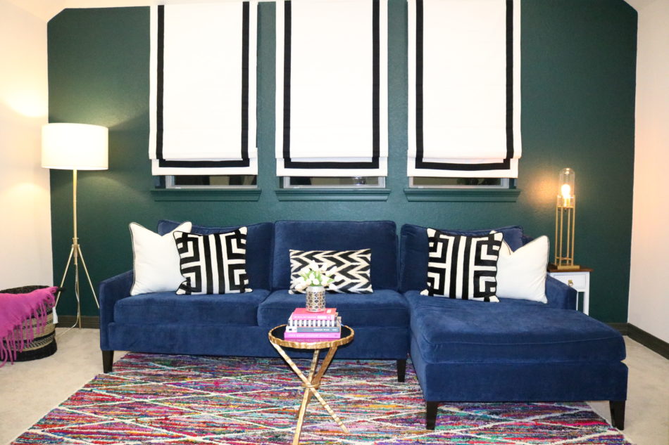 navy sofa, navy couch, navy sofa by green wall, navy sofa in front of green wall, navy chaise, navy furniture, navy as a neutral, why you need a navy sofa, navy living room, navy room, navy furniture, navy accents, navy sectional, navy daybed, navy with black and white, navy with bold colors
