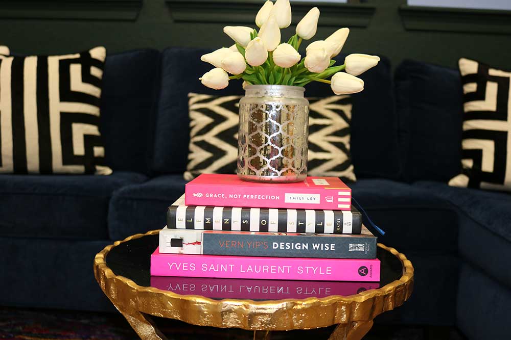 Decorating around a navy blue sofa