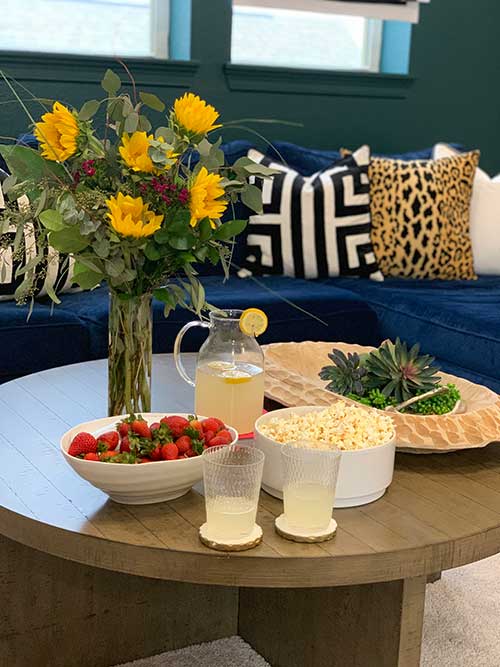 Decorating around a navy blue sofa