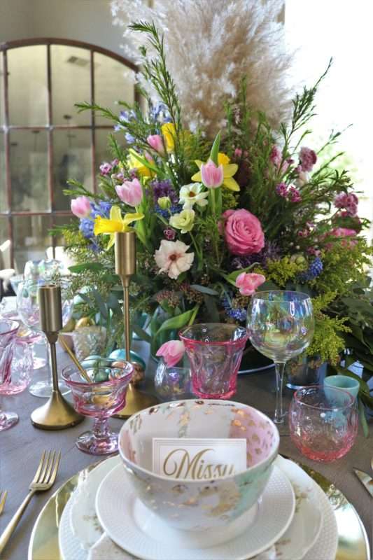 MRI, houston interior designer, home decor influencer, Easter, Easter table setting, Easter flowers, colored glass, spring flowers, cascading flowers, bunny, kids Easter table, fun Easter table setting, Easter decorations, how to decorate for Easter, easy Easter decorations, pink glasses, Easter table setting, Easter tabelscape, elegant dining table, whimsical kids table, playful easter table, vintage table setting, table setting ideas, easter table setting ideas, colorful table setting, achievable easter table setting, table décor, chic easter table setting, budget friendly table setting