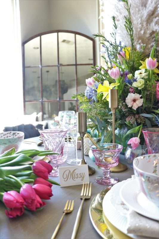 MRI, houston interior designer, home decor influencer, Easter, Easter table setting, Easter flowers, colored glass, spring flowers, cascading flowers, bunny, kids Easter table, fun Easter table setting, Easter decorations, how to decorate for Easter, easy Easter decorations, pink glasses, Easter table setting, Easter tabelscape, elegant dining table, whimsical kids table, playful easter table, vintage table setting, table setting ideas, easter table setting ideas, colorful table setting, achievable easter table setting, table décor, chic easter table setting, budget friendly table setting