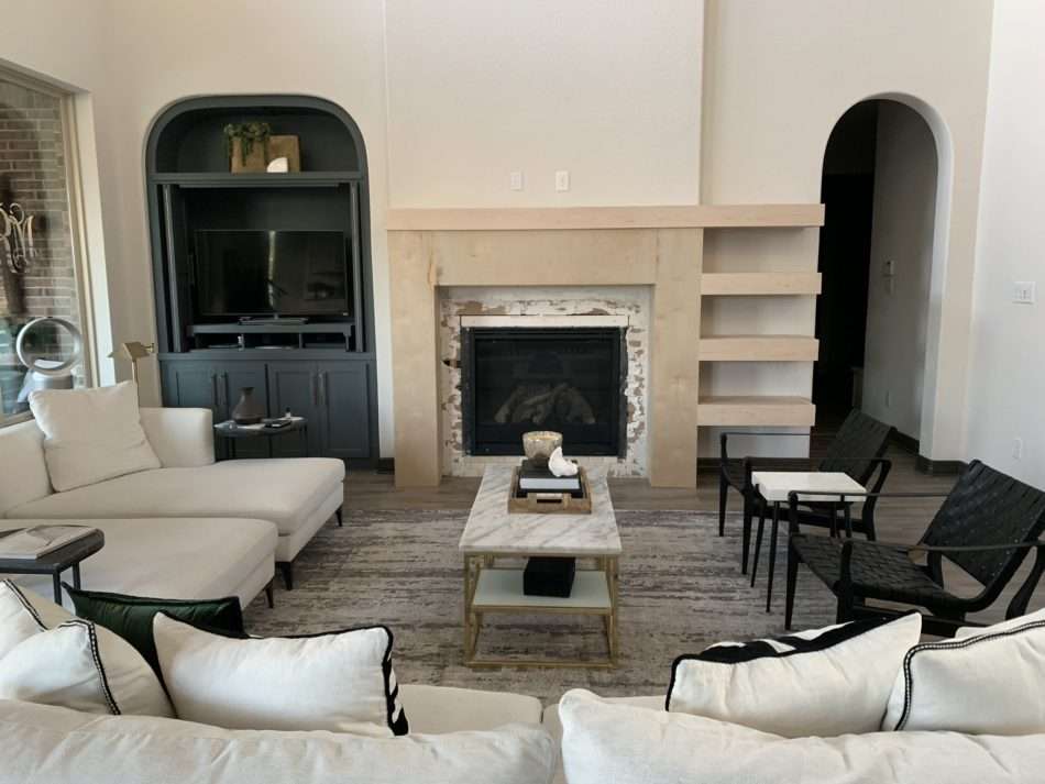 Beaumont Interior Designers, creating balance on wall with fireplace, design modern fireplace, designing floating shelves, fireplace remodel reveal, fireplace with floating shelves, grand fireplace, houston interior design, Houston Interior Designers, how to design a modern fireplace, How to remodel a fireplace, How to scale a fireplace remodel, Melissa Roberts Interiors, Modern Fireplace Remodel, mri, original fireplace designs, remodel dated fireplace, step by step guide to remodeling fireplace, tile to use for fireplace, unique fireplace design, unique fireplace elements, what color to paint cabinets, what color to paint shelves, What stain color to use for shelves