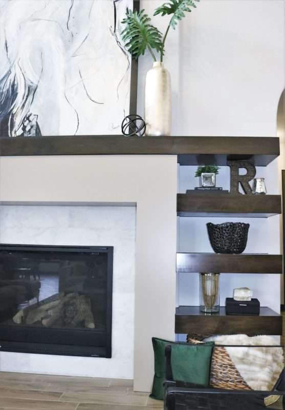 Beaumont Interior Designers, creating balance on wall with fireplace, design modern fireplace, designing floating shelves, fireplace remodel reveal, fireplace with floating shelves, grand fireplace, houston interior design, Houston Interior Designers, how to design a modern fireplace, How to remodel a fireplace, How to scale a fireplace remodel, Melissa Roberts Interiors, Modern Fireplace Remodel, mri, original fireplace designs, remodel dated fireplace, step by step guide to remodeling fireplace, tile to use for fireplace, unique fireplace design, unique fireplace elements, what color to paint cabinets, what color to paint shelves, What stain color to use for shelves