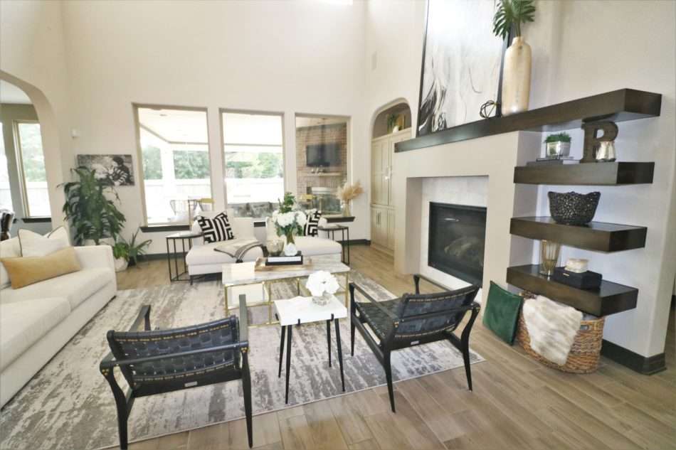 Beaumont Interior Designers, creating balance on wall with fireplace, design modern fireplace, designing floating shelves, fireplace remodel reveal, fireplace with floating shelves, grand fireplace, houston interior design, Houston Interior Designers, how to design a modern fireplace, How to remodel a fireplace, How to scale a fireplace remodel, Melissa Roberts Interiors, Modern Fireplace Remodel, mri, original fireplace designs, remodel dated fireplace, step by step guide to remodeling fireplace, tile to use for fireplace, unique fireplace design, unique fireplace elements, what color to paint cabinets, what color to paint shelves, What stain color to use for shelves