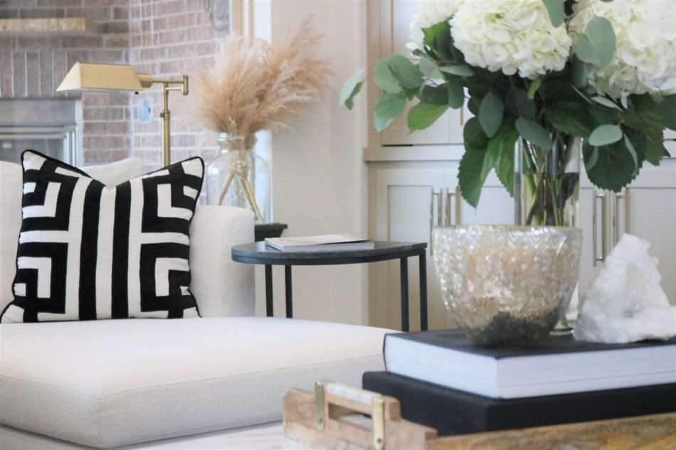 MRI, Melissa Roberts Interiors, Houston Interior Designer, Houston Interior Design, Beaumont Interior Design, Living Room Update, Living Room Reveal, Living Room Refresh, How to refresh your living room, summer living room, kitchen barstools, kitchen counter stools, kitchen pendant lights, living in your home during construction, fireplace remodel, modern fireplace, white sofa, wall mirror, gold wall mirror, chase lounge, unique chairs, living room accessories, how to style your living room, how to stage your living room, 2019 Living Rooms, minimalist design