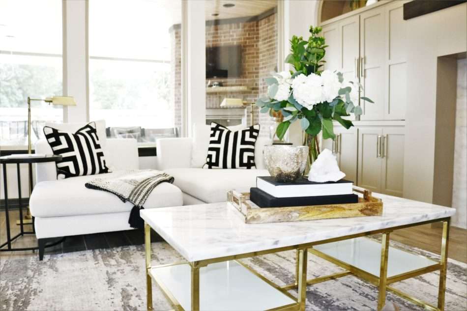 MRI, Melissa Roberts Interiors, Houston Interior Designer, Houston Interior Design, Beaumont Interior Design, Living Room Update, Living Room Reveal, Living Room Refresh, How to refresh your living room, summer living room, kitchen barstools, kitchen counter stools, kitchen pendant lights, living in your home during construction, fireplace remodel, modern fireplace, white sofa, wall mirror, gold wall mirror, chase lounge, unique chairs, living room accessories, how to style your living room, how to stage your living room, 2019 Living Rooms, minimalist design