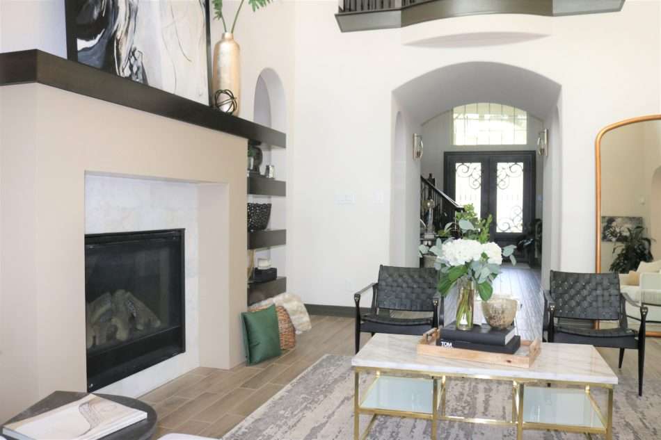 MRI, Melissa Roberts Interiors, Houston Interior Designer, Houston Interior Design, Beaumont Interior Design, Living Room Update, Living Room Reveal, Living Room Refresh, How to refresh your living room, summer living room, kitchen barstools, kitchen counter stools, kitchen pendant lights, living in your home during construction, fireplace remodel, modern fireplace, white sofa, wall mirror, gold wall mirror, chase lounge, unique chairs, living room accessories, how to style your living room, how to stage your living room, 2019 Living Rooms, minimalist design