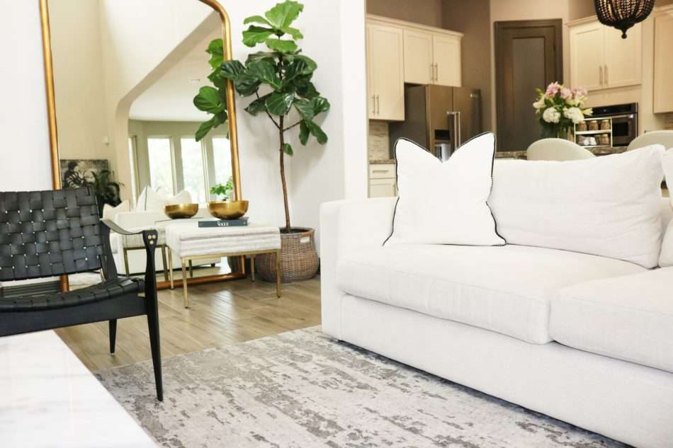 MRI, Melissa Roberts Interiors, Houston Interior Designer, Houston Interior Design, Beaumont Interior Design, Living Room Update, Living Room Reveal, Living Room Refresh, How to refresh your living room, summer living room, kitchen barstools, kitchen counter stools, kitchen pendant lights, living in your home during construction, fireplace remodel, modern fireplace, white sofa, wall mirror, gold wall mirror, chase lounge, unique chairs, living room accessories, how to style your living room, how to stage your living room, 2019 Living Rooms, minimalist design