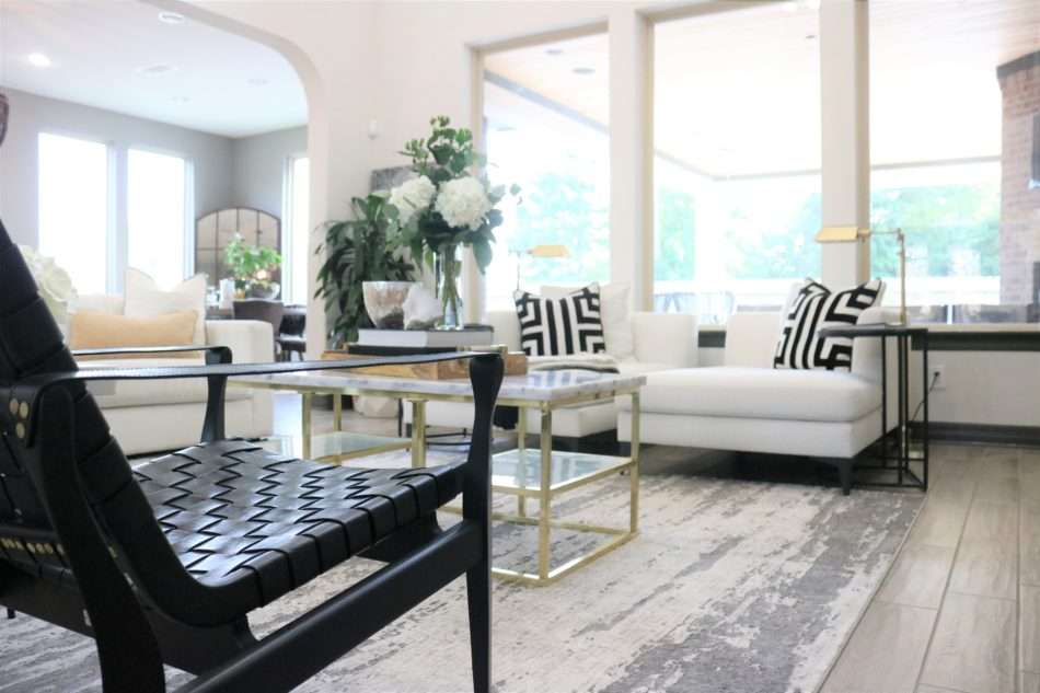 MRI, Melissa Roberts Interiors, Houston Interior Designer, Houston Interior Design, Beaumont Interior Design, Living Room Update, Living Room Reveal, Living Room Refresh, How to refresh your living room, summer living room, kitchen barstools, kitchen counter stools, kitchen pendant lights, living in your home during construction, fireplace remodel, modern fireplace, white sofa, wall mirror, gold wall mirror, chase lounge, unique chairs, living room accessories, how to style your living room, how to stage your living room, 2019 Living Rooms, minimalist design