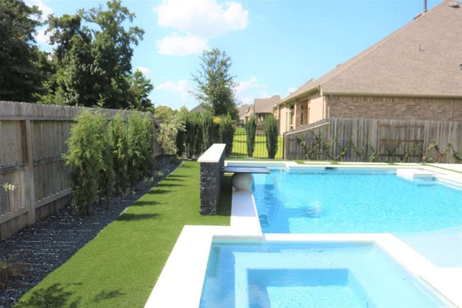 We anchored all the beds with Blackstar gravel, adding the perfect black accent. Eventually, we want to restain our fence...once our money tree grows back!