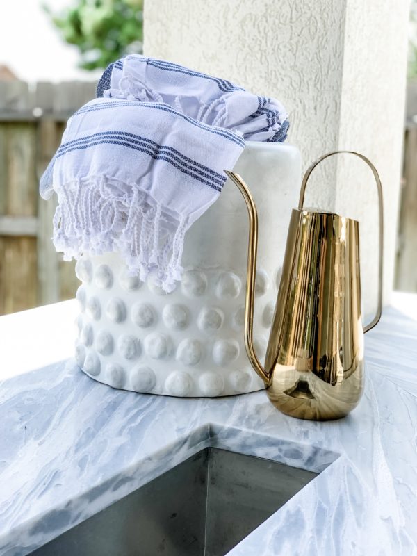 modern patio, modern outdoor furniture, modern patio decor, modern pool design, contemporary pool design, contemporary patio, fall patio decor, modern furnished patio, modern pool. black and white patio, black and white outdoor rug, outdoor sofa, outdoor chaise lounges, styled patio, styled pool, styled chaise lounges, towel rack, pool towels, towels by the pool, pool towel storage, pool storage solutions, outdoor dining, dining table, outdoor dining table, outdoor chandelier, patio dining table, outdoor planters, modern planters