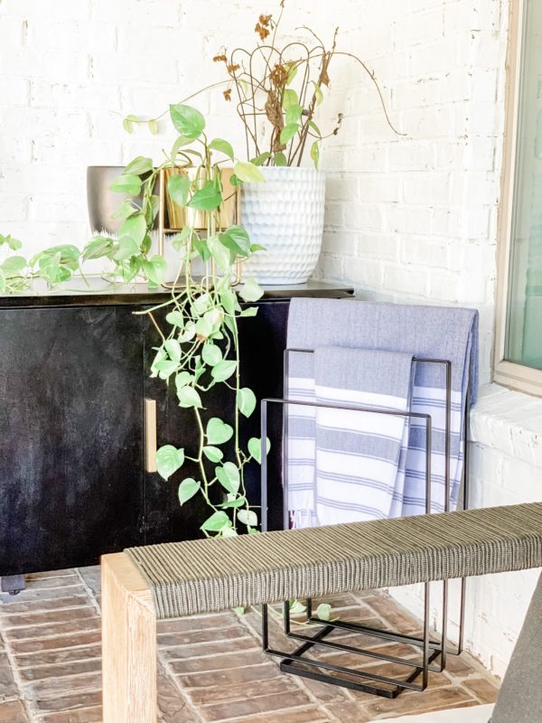 modern patio, modern outdoor furniture, modern patio decor, modern pool design, contemporary pool design, contemporary patio, fall patio decor, modern furnished patio, modern pool. black and white patio, black and white outdoor rug, outdoor sofa, outdoor chaise lounges, styled patio, styled pool, styled chaise lounges, towel rack, pool towels, towels by the pool, pool towel storage, pool storage solutions