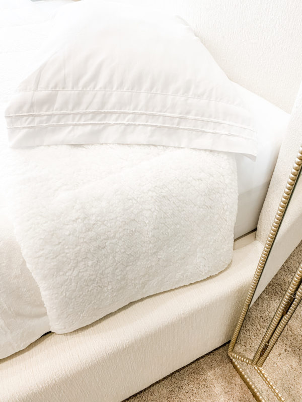 MRI, Melissa Roberts Interiors, Houston Interior Design, Houston Interior Designer, How to Make a Bed Like a Pro, Pottery Barn Bed, Duvet Cover, Pillows, Fur Pillows, Throws, Styling a Bed, Styling a Bed Like a Pro, How to Style a Bed, How to Style a Bed Like a Pro, Affordable Sheets, Affordable Bedding, Chic Quilts, Quilts, Pillow Covers, Pillow Sizing for a bed, Hospital Corners, Pillow Sizing Guide, how to add an accent color to your bedroom, adding an accent color, accent color Throw blanket, 2020, classic blue, color of the year 2020, navy, navy blanket, navy throw blanket