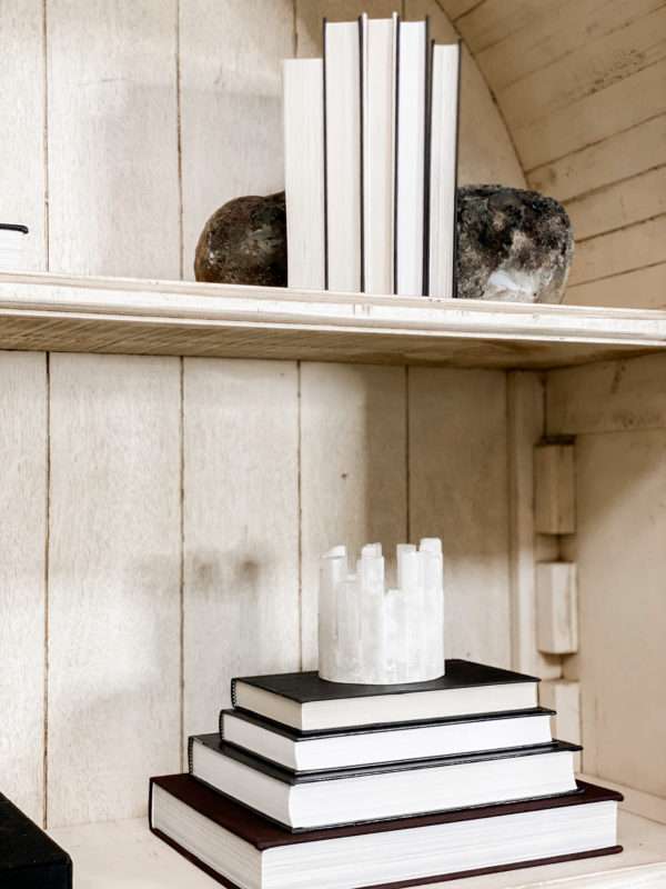 MRI, Melissa Roberts Interiors, Houston Interior Design, Houston Interior Designers, Arched Cabinet, Bookcase, Styling a Cabinet, Styling a Bookcase, Book Shelf, Styling a Bookshelf, How Interior Designer Style a bookcase, Modern, Modern Styled shelf, Style a Bookcase Like a pro, styling a cabinet with books, staging a bookcase, staging, how to stage a home, home décor, home décor ideas, bookcase hack, styling hacks, updating old bookcase, before and after, how to decorate a bookcase, how to decorate a cabinet, modern styling, organic home décor, neutral color tones, neutral color tones home décor, floating shelf, etagere