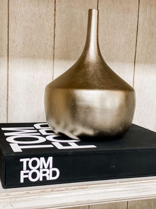 MRI, Melissa Roberts Interiors, Houston Interior Design, Houston Interior Designers, Arched Cabinet, Bookcase, Styling a Cabinet, Styling a Bookcase, Book Shelf, Styling a Bookshelf, How Interior Designer Style a bookcase, Modern, Modern Styled shelf, Style a Bookcase Like a pro, styling a cabinet with books, staging a bookcase, staging, how to stage a home, home décor, home décor ideas, bookcase hack, styling hacks, updating old bookcase, before and after, how to decorate a bookcase, how to decorate a cabinet, modern styling, organic home décor, neutral color tones, neutral color tones home décor, floating shelf, etagere